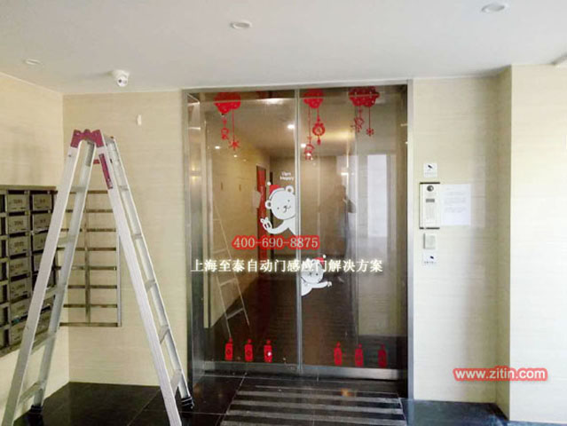 Electric glass sensor door for residential community